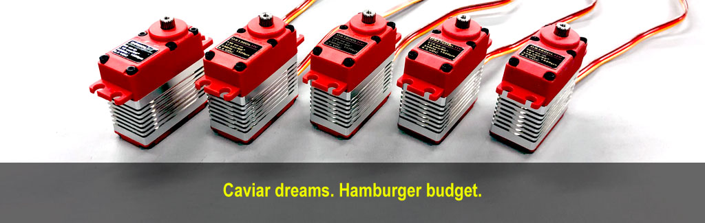 Five ProModeler DL-series servos with slogan; Caviar dreams. Hamburger budget.